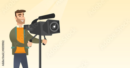 Cameraman with a movie camera on tripod.