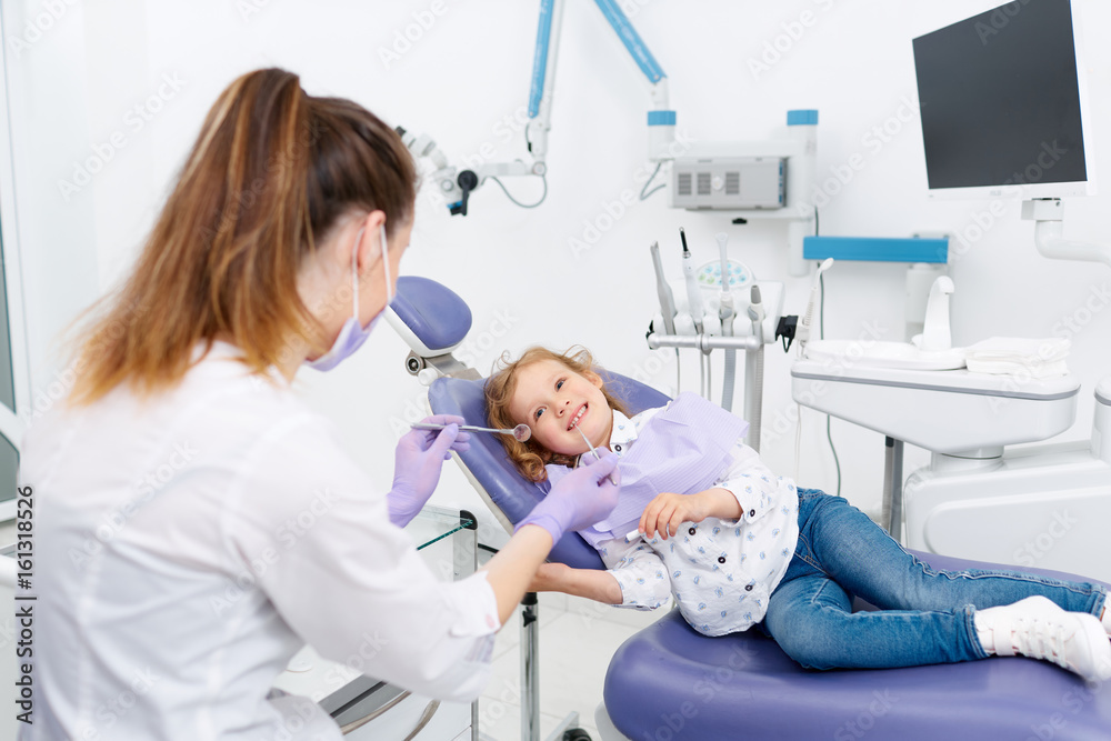 Smiling little patient at dentist