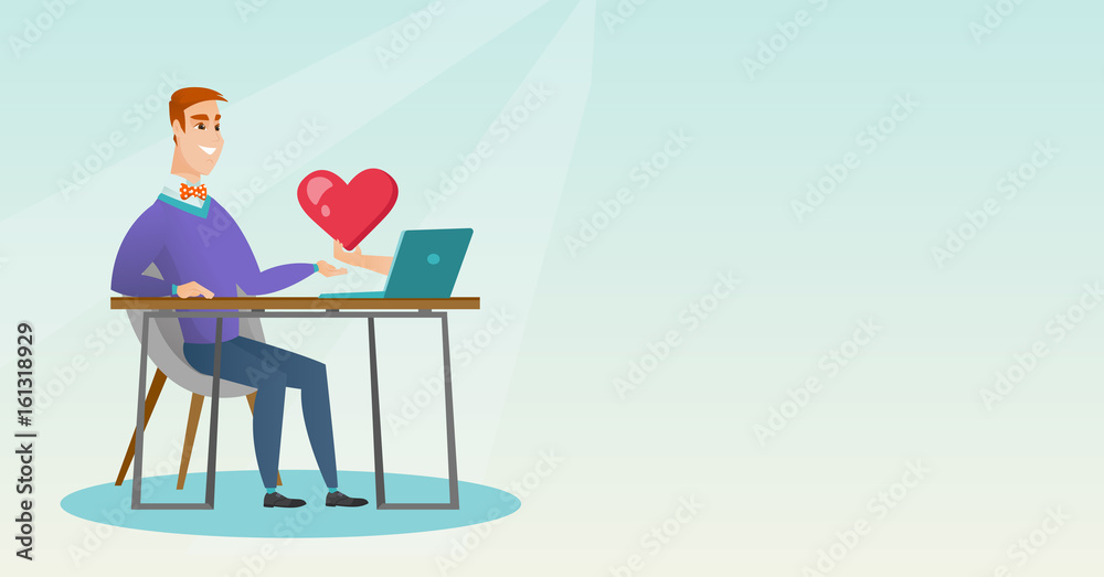 Young man using a laptop online dating.