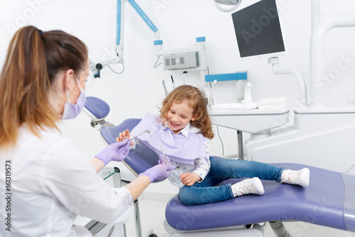 Little girl in dentist chair