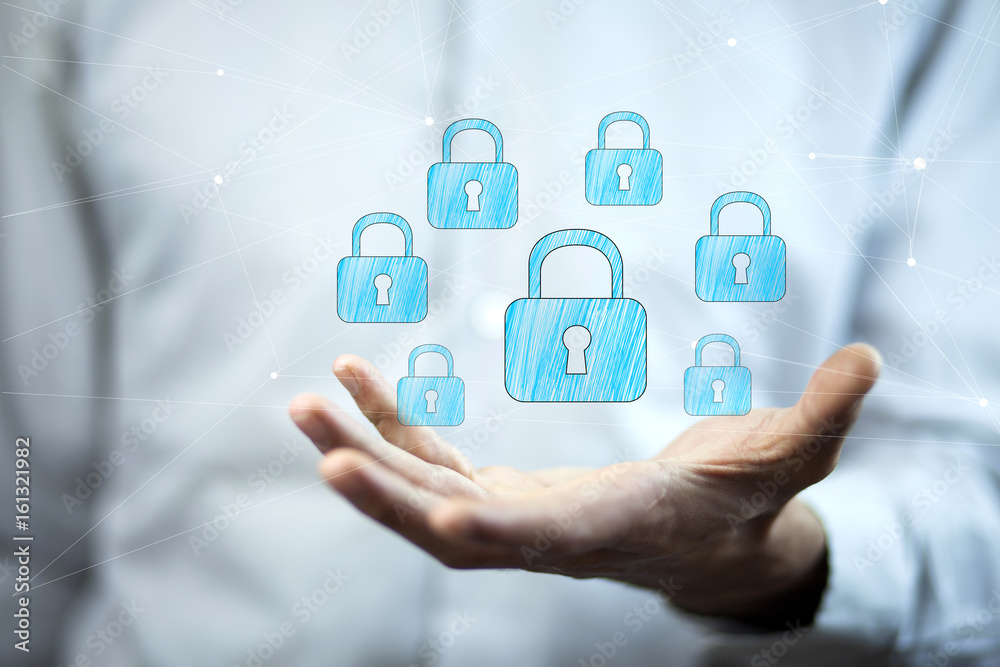 businessman holding lock in hand businessman holding lock in hand