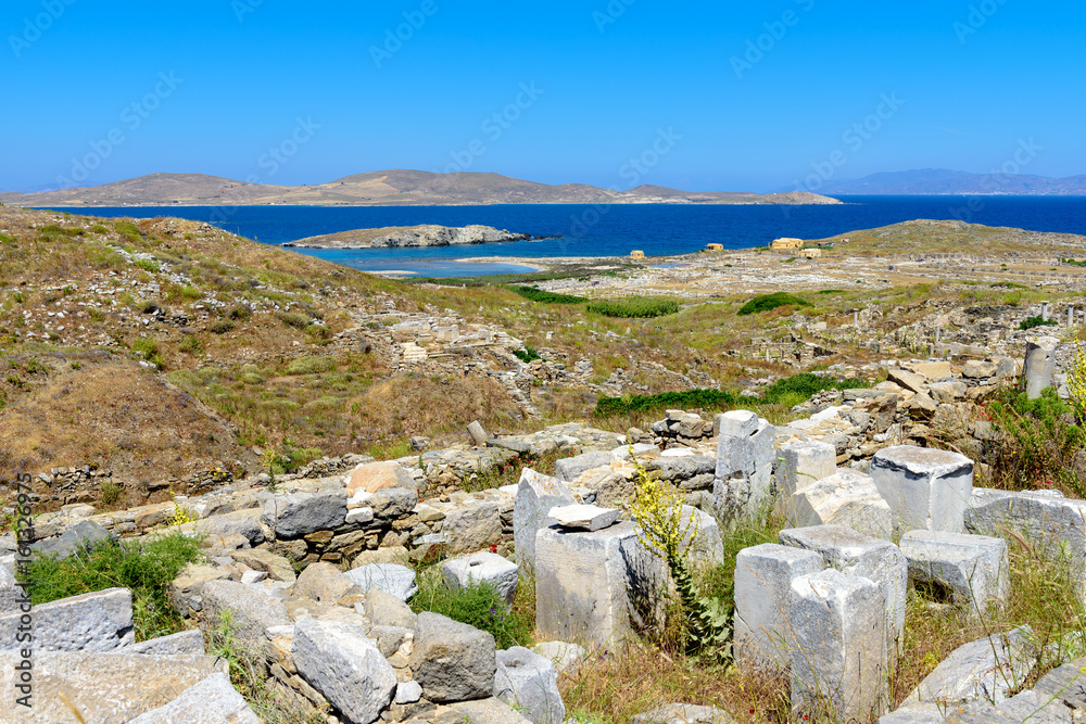 View of Delos island, the most big archaeological site of Cyclades archipelago. Greece. View of Delos island, the most big archaeological site of Cyclades archipelago. Greece.