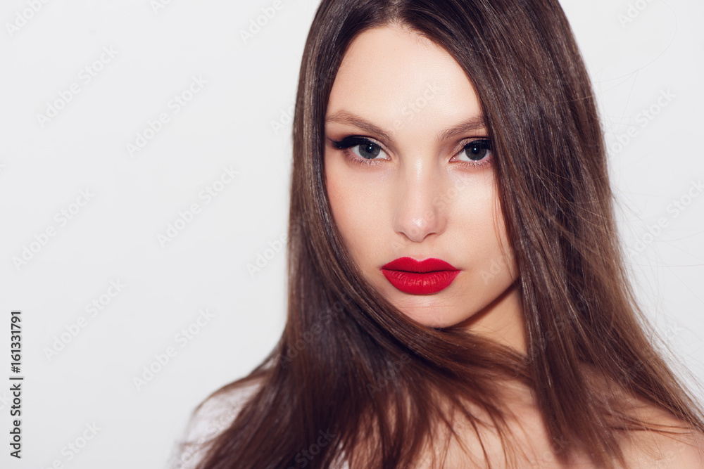 Close-up portrait of beautiful woman with bright make-up