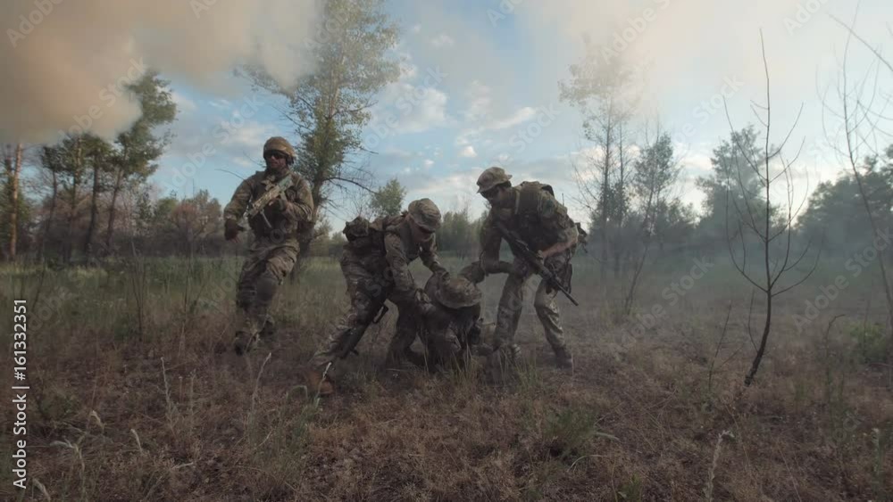 Soldiers getting injured while shooting and having contact on battlefield. Soldiers getting injured while shooting and having contact on battlefield.