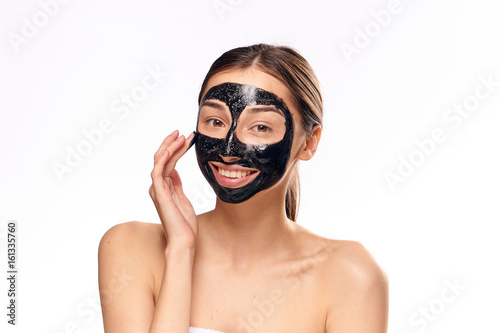 Face care, skin problem, woman in cosmetic mask, woman on light background