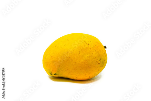 Fresh wild mango isolated on white.