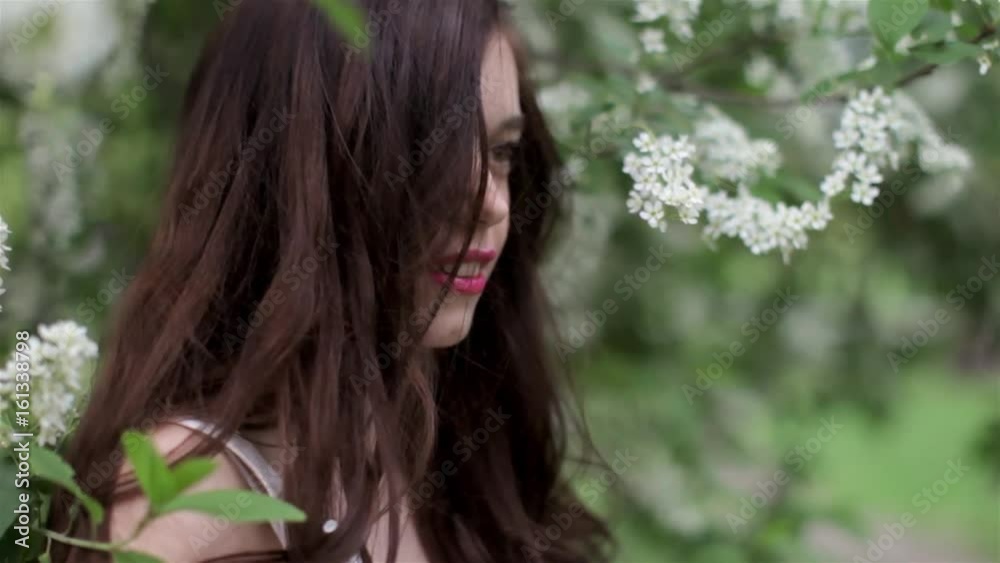 Portrait of a Beautiful Girl Among The Flowering Tree Portrait of a Beautiful Girl Among The Flowering Tree