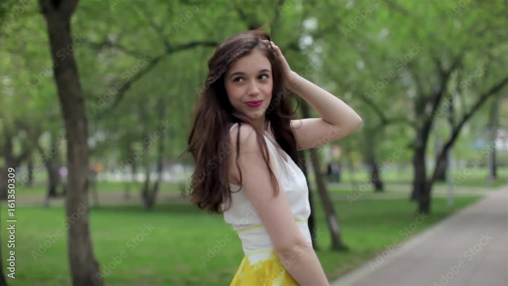 Portrait of a Beautiful Young Girl in The Park