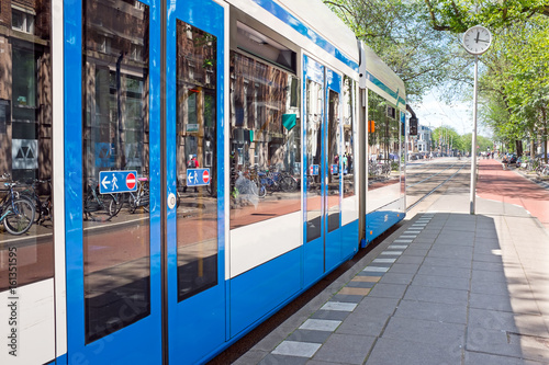 Tram departing from Weesperplein in Amsterdam Netherlands