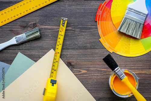 Billede på lærred decorating and house renovation tools and accessories on wooden table background