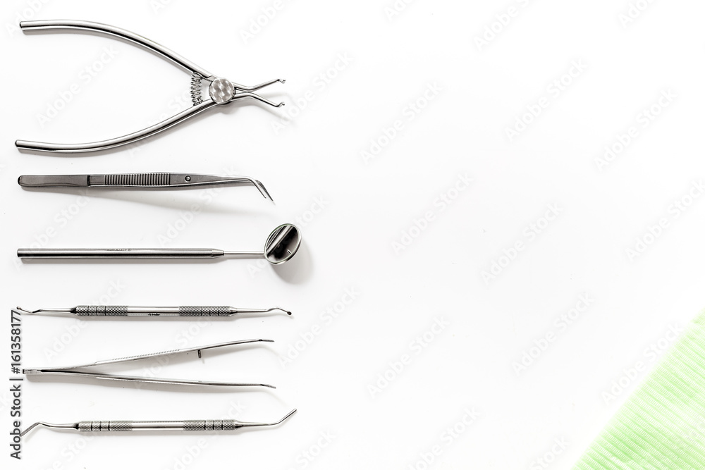 dentist office with tools for teeth care on white background top view mock up