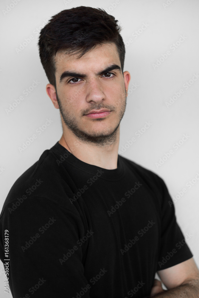 Seventeen Years Old Handsome and Confident Young Man, Close Up, Looking at Camera Seventeen Years Old Handsome and Confident Young Man, Close Up, Looking at Camera