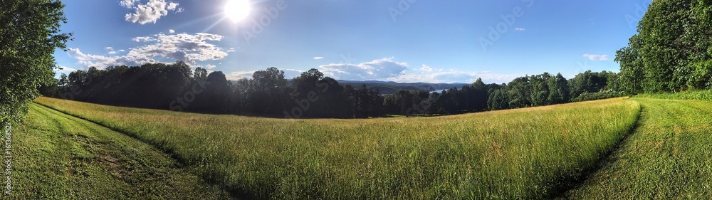 wide panorama of foothills over a river