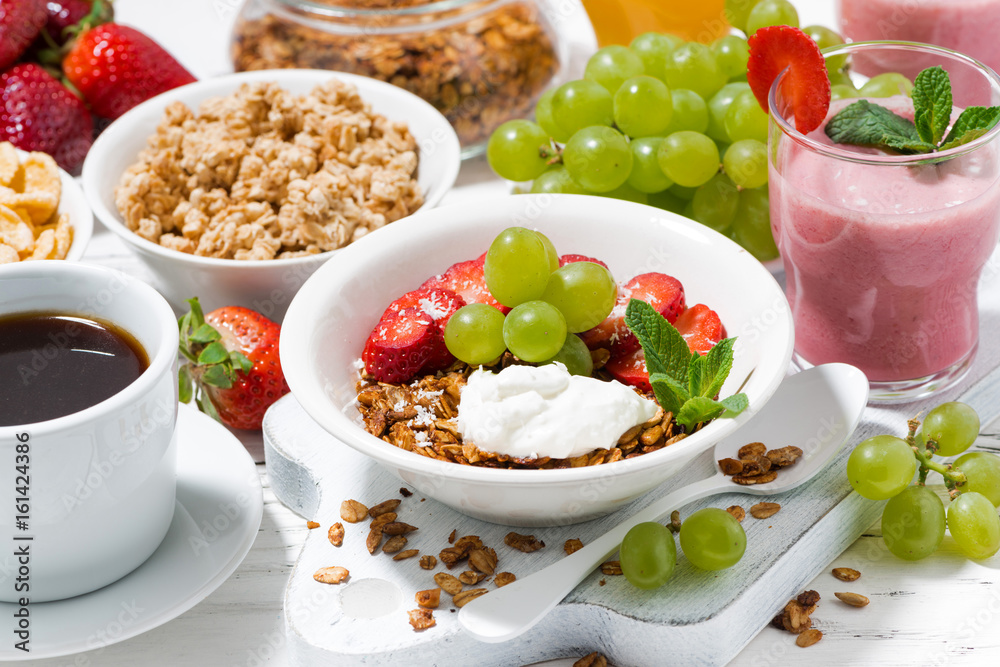 delicious and healthy breakfast with fruits, granola and milkshake delicious and healthy breakfast with fruits, granola and milkshake