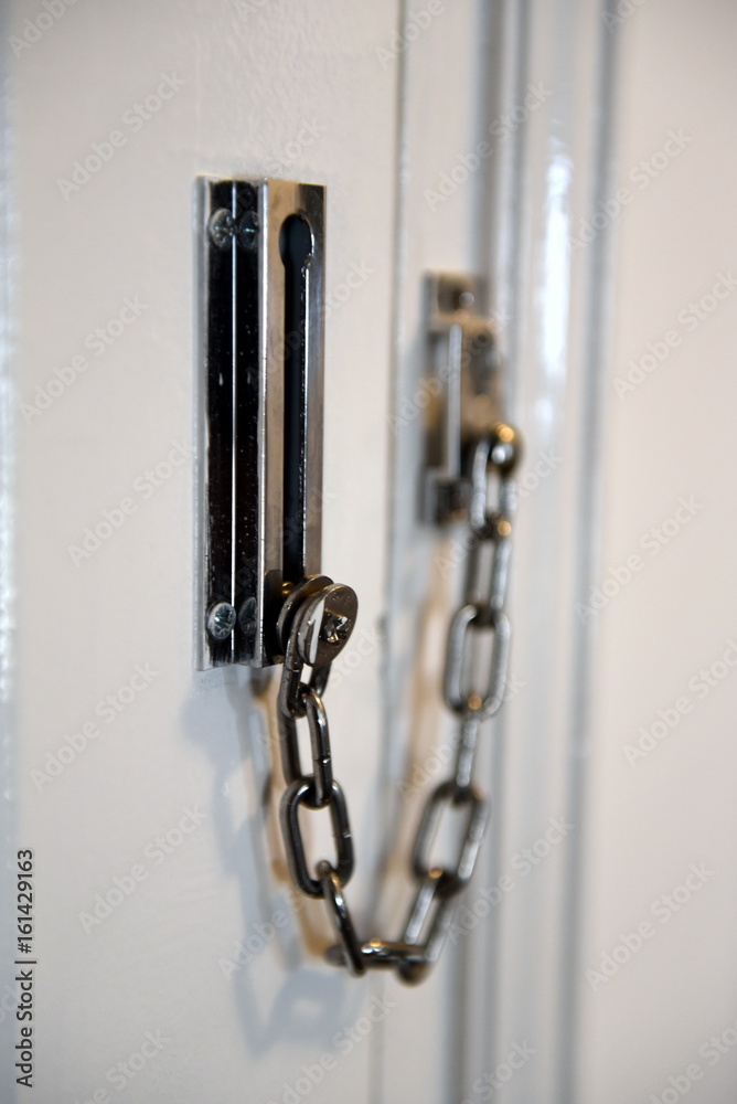 lock on door with chain lock on door with chain