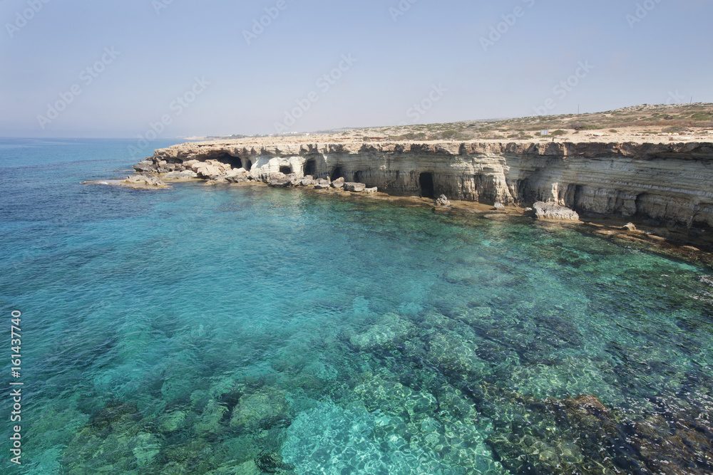 Sea caves of Cavo greco cape. Cyprus. Mediterranean sea