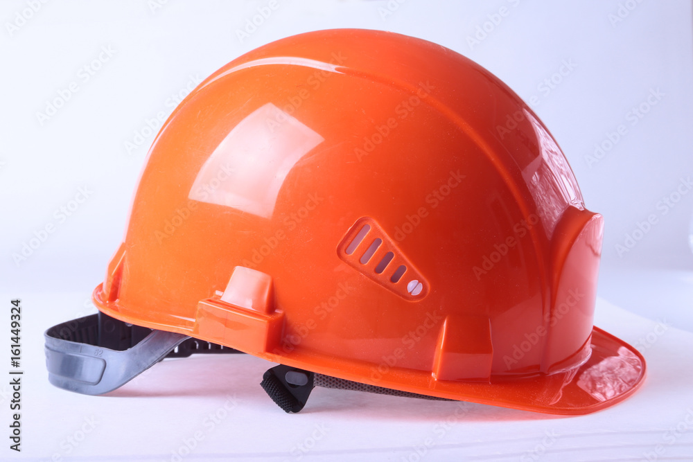 Orange safety hard hat, isolated on white background. Orange safety hard hat, isolated on white background.