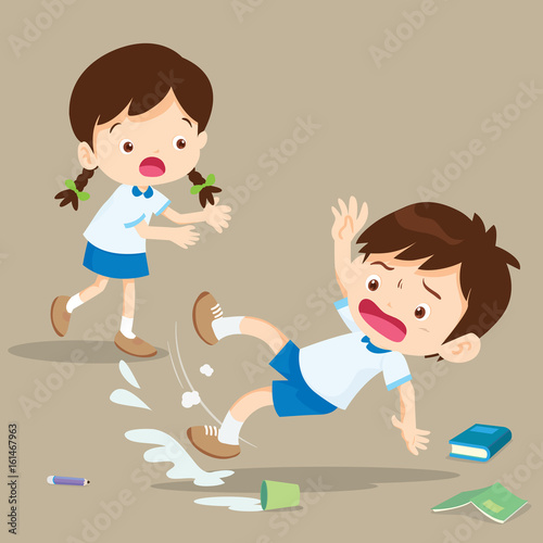 student boy falling on wet floor