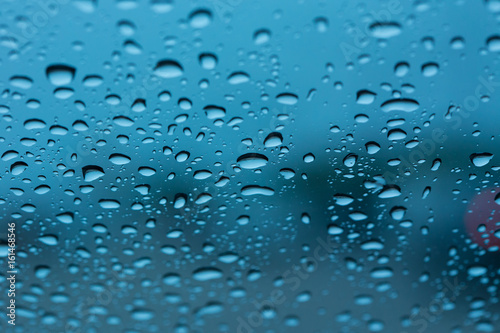 Abstract macro photo background with water drops on glass