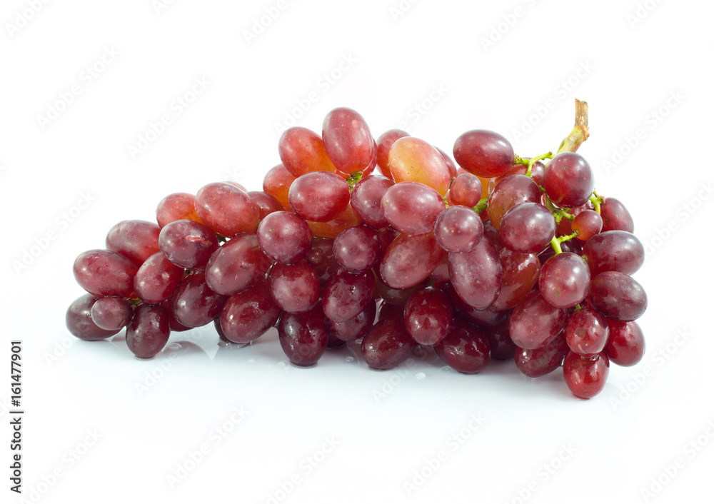 Ripe red grape. Pink bunch with leaves isolated on white. With clipping path. Full depth of field.