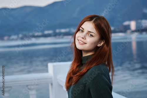 Woman on the waterfront, woman on the sea, woman on the sea background