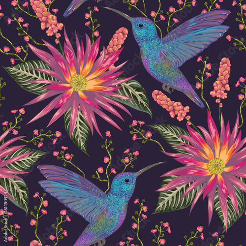 Seamless pattern with hummingbird, tropical flowers,berries and leaves. Exotic flora and fauna. Vintage hand drawn vector illustration in watercolor style