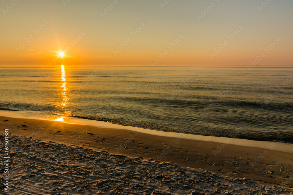 Obraz premium Sea sunset on the beach in the summer, landscape