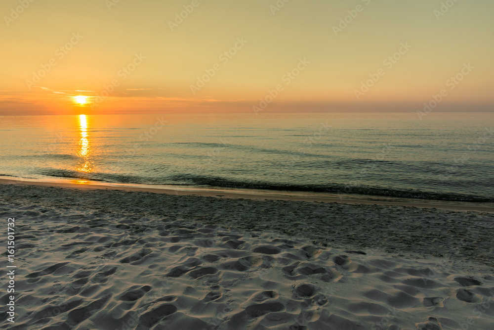 Beautiful sunset on the beach in the summer, landscape