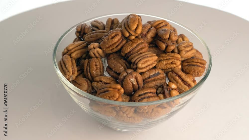 The nut pecan rotates on the turntable. The nut pecan rotates on the turntable.