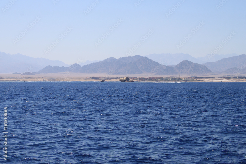 Red sea, Egypt, blue water, broken ship, sky