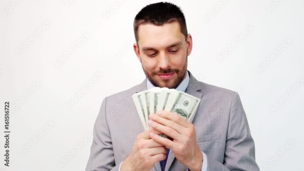 happy businessman with lot of dollar money happy businessman with lot of dollar money
