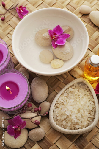 SPA still life  bowl of water  bath salt and aromatherapy candles