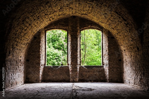 brick vault, old ancient castle room with windows, grunge