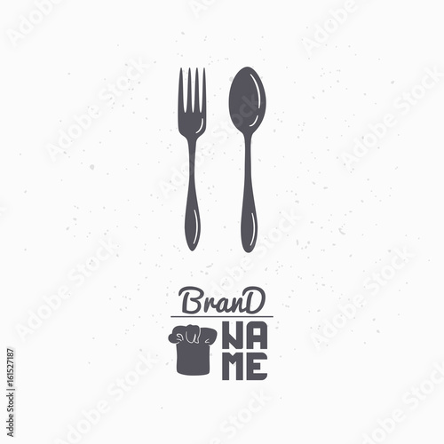 Hand drawn silhouette of spoon and fork. Restaurant logo template for craft food packaging, menu or brand identity