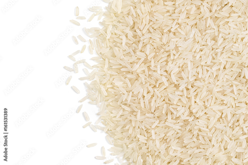 Parboiled rice scattered on white background. Copy space, top view, high resolution product. Healthy food concept