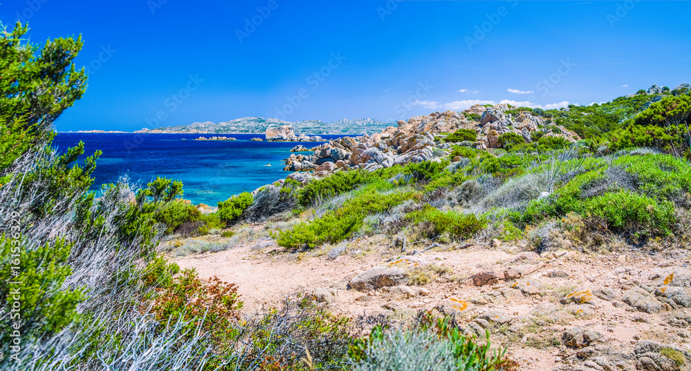 Pure clear azure sea water and amazing rocks on coast of Maddalena island, Sardinia, Italy