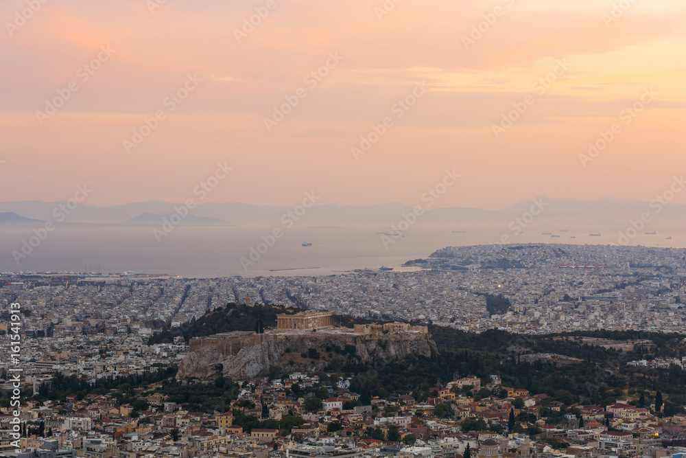 View of Athens and Acropolis from Lycabettus hill at sunset, Greece. 
