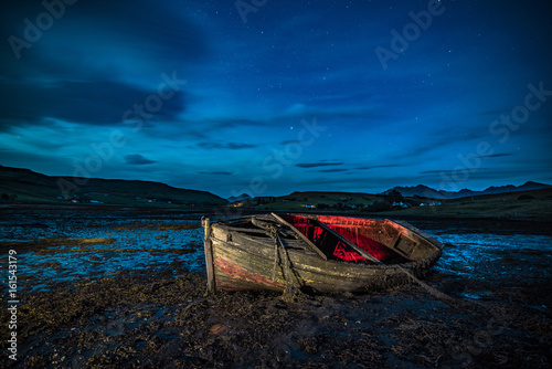Lonely boat at night