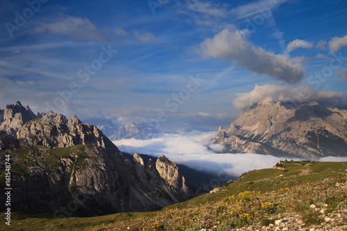 Dolomites sunrise above clouds