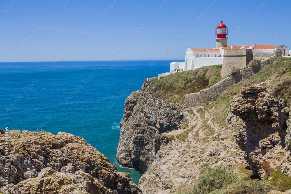 Lighthouse at Cabo de Sao Vicente, Algarve, Portugal. The lighthouse is situated on the tip of the Cape of St. Vincent, the extreme southwesternmost point in Europe
