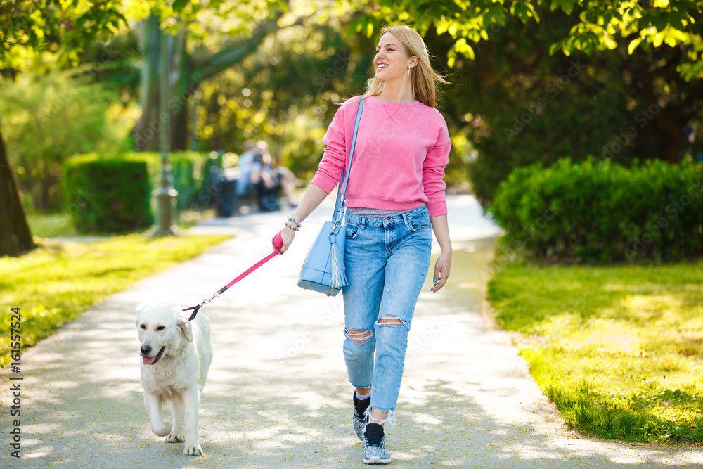 Woman enjoying park with dog Woman enjoying park with dog