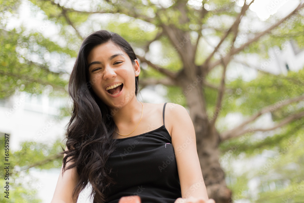 A portrait of a beautiful asian woman smiling