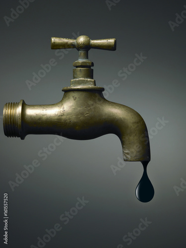 Wallpaper Mural Old faucet with the last oil drop, abstract on dramatic background Torontodigital.ca