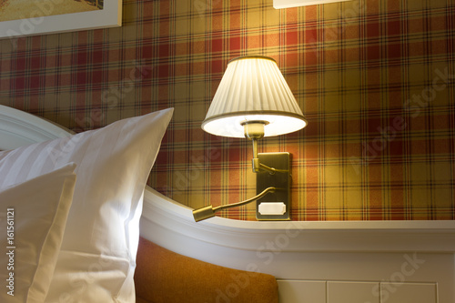 Sconce lamp on the wall in ...