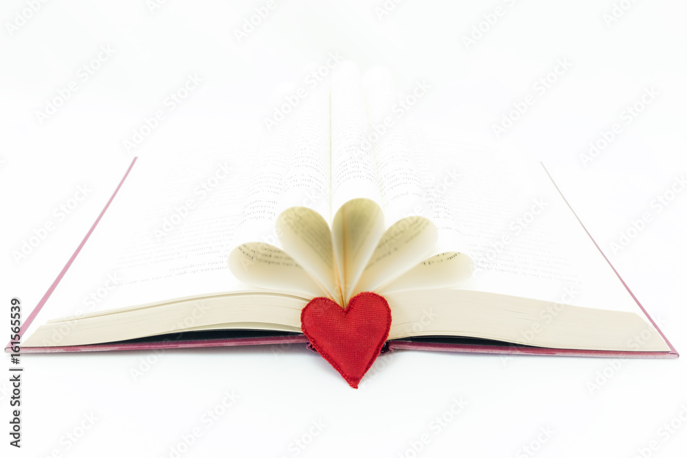 open book and a red heart next to the book
open book and a red heart next to the book