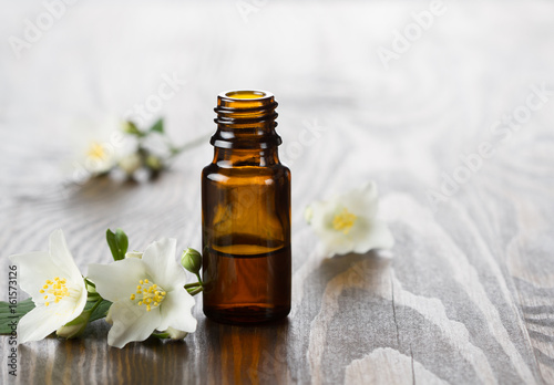 Jasmine essential oil and jasmine flowers