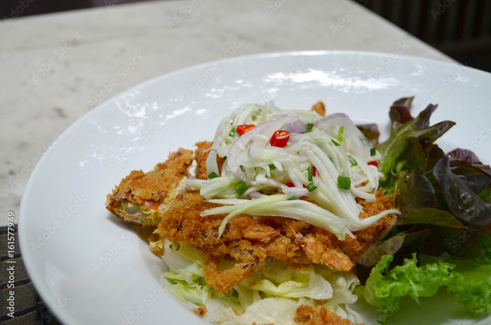 Thai style food, deep fried soft shell crab with spicy sauce Thai style food, deep fried soft shell crab with spicy sauce