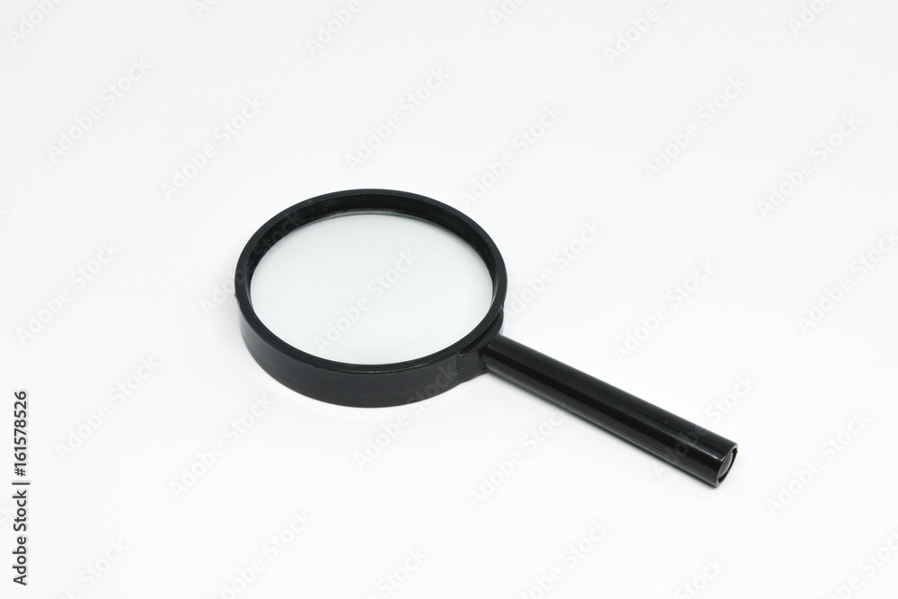 Magnifying glass on the white background Magnifying glass on the white background
