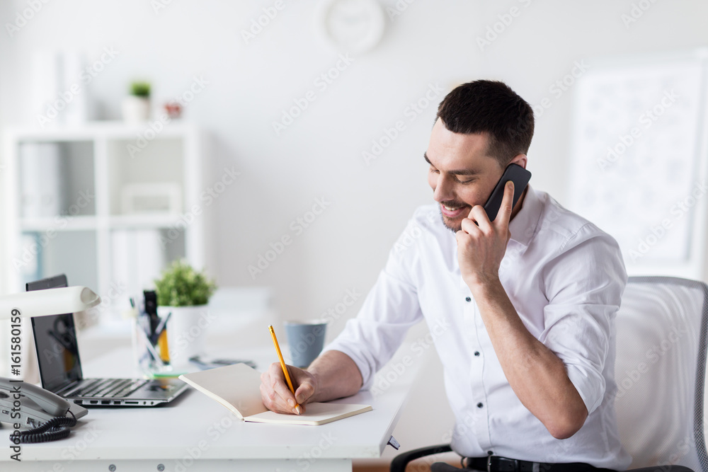 businessman calling on smartphone at office businessman calling on smartphone at office