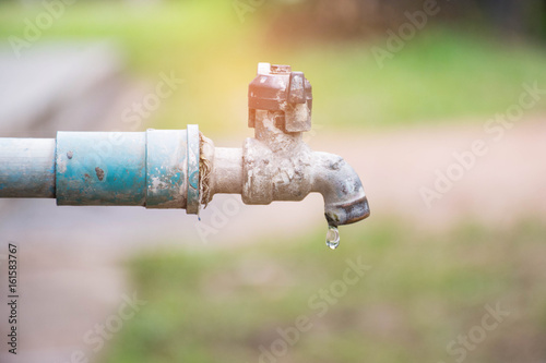 water drop in tap,Leaking water